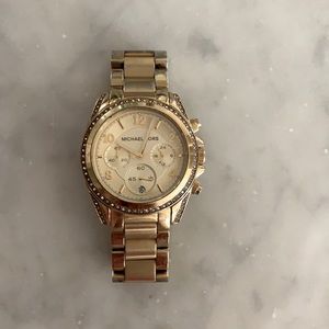 Michael Kors women’s gold and rhinestone watch